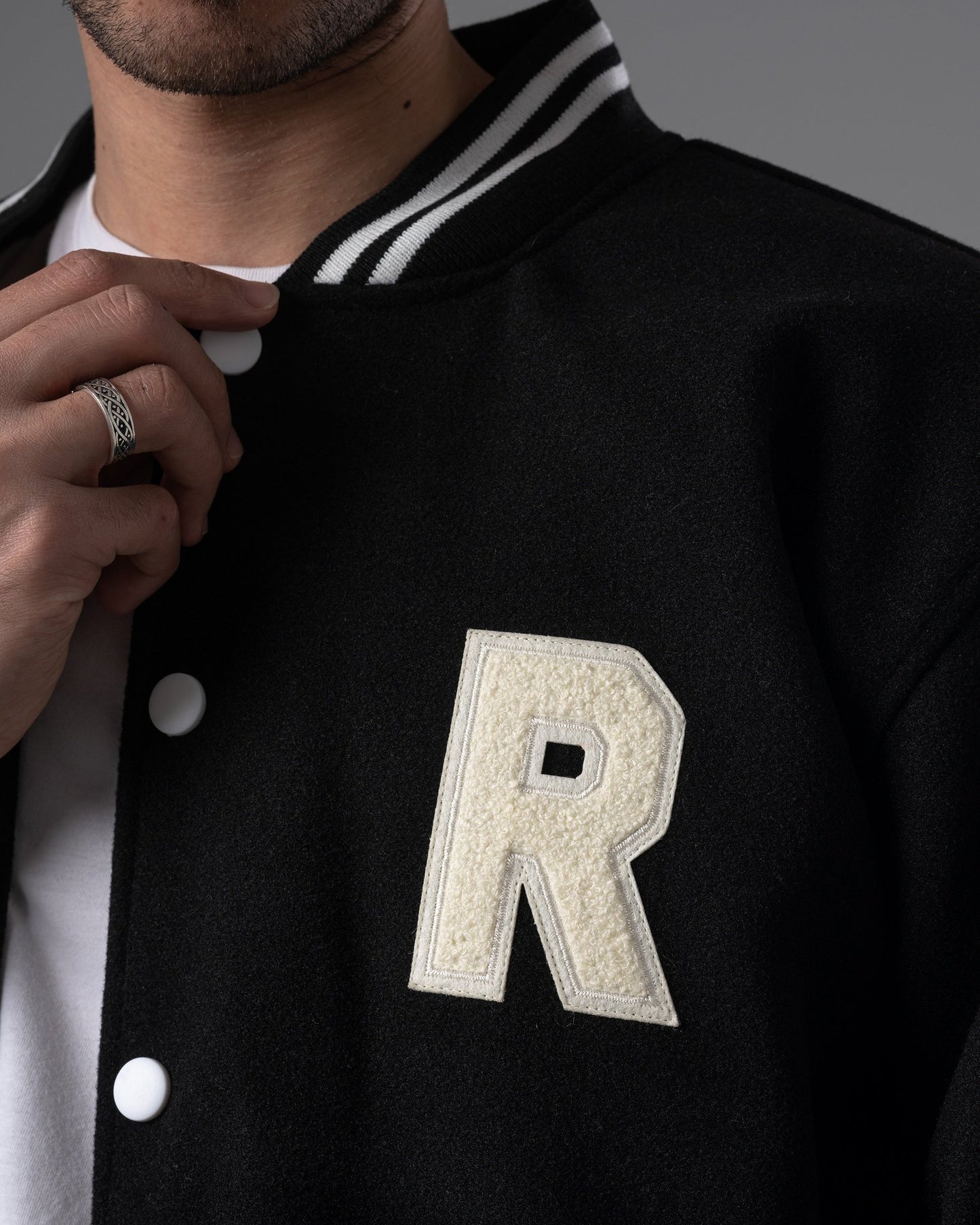 Black varsity jacket